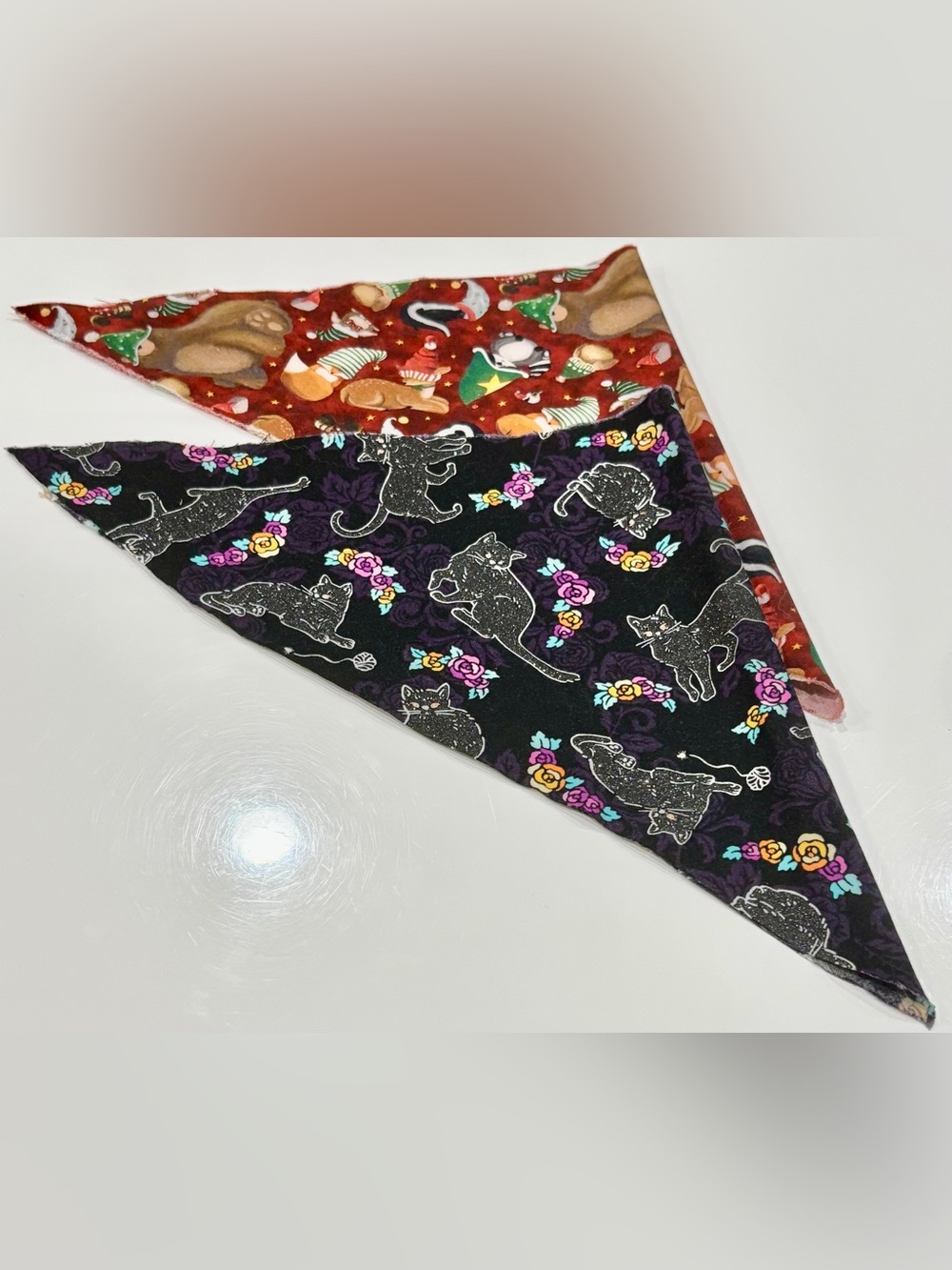 A set of Two Small Pet Bandanas in Different Colors and patterns